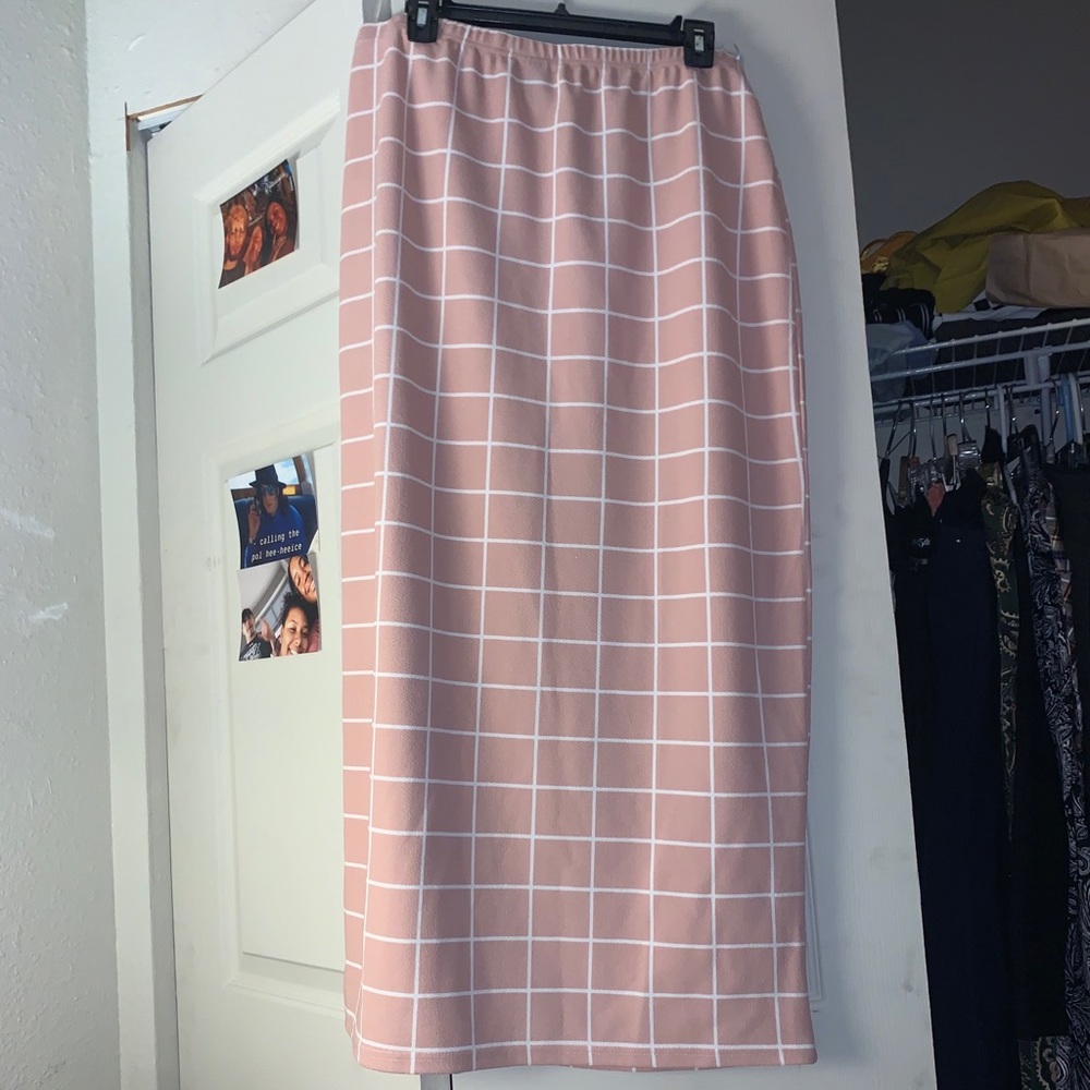 long curve hugging skirt